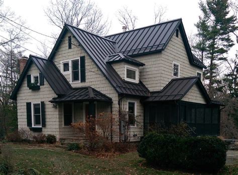 houses with dark bronze metal roof|bronze standing seam metal roof.